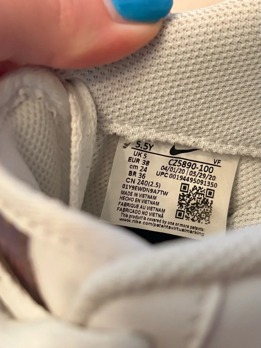 Nike Kids White Sneakers with Multicolor Swoosh Accents